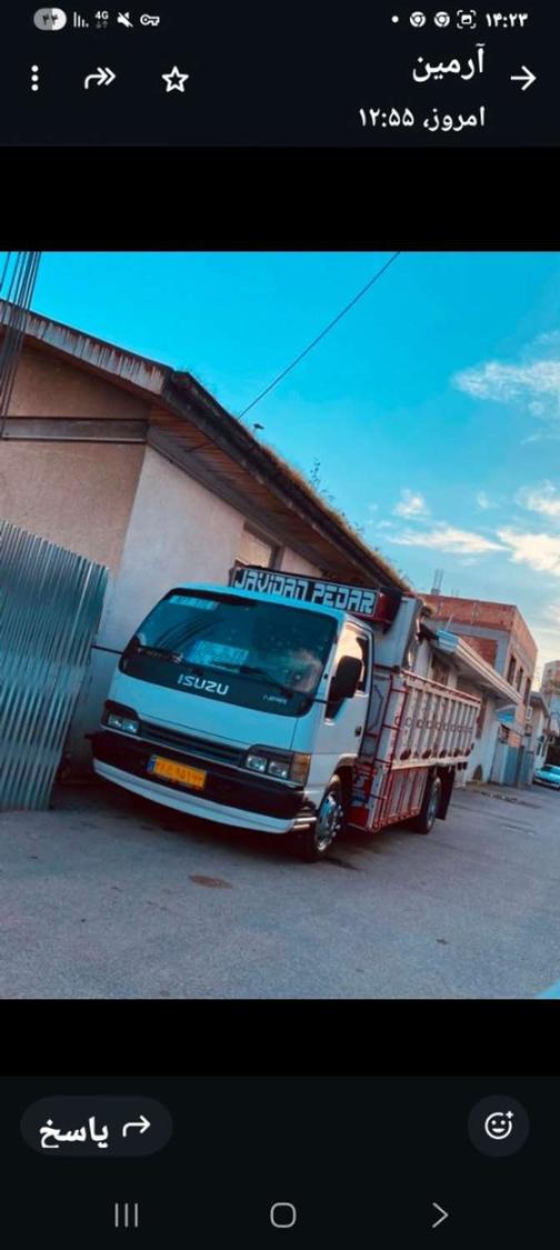 کامیونت کمپرسی ایسوزو NQR70PL ظرفیت 8 تن رنگ نارنجی