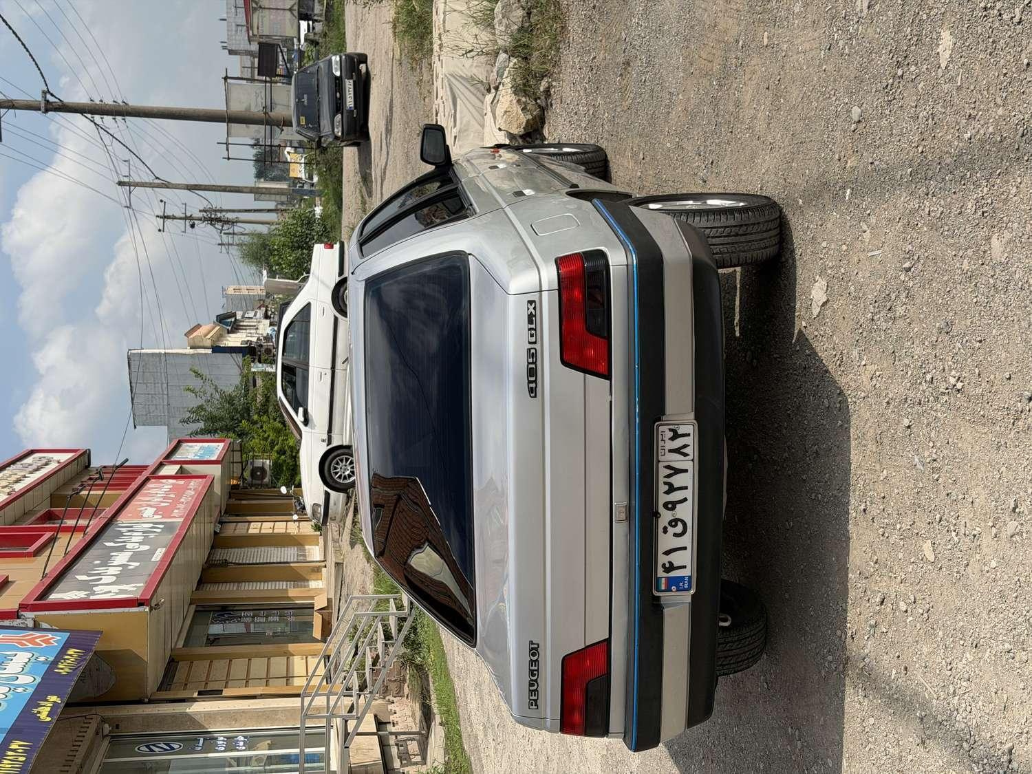 پژو 405GLX-XU7-CNG مدل 1392 به شماره پلاک 16-693ط31